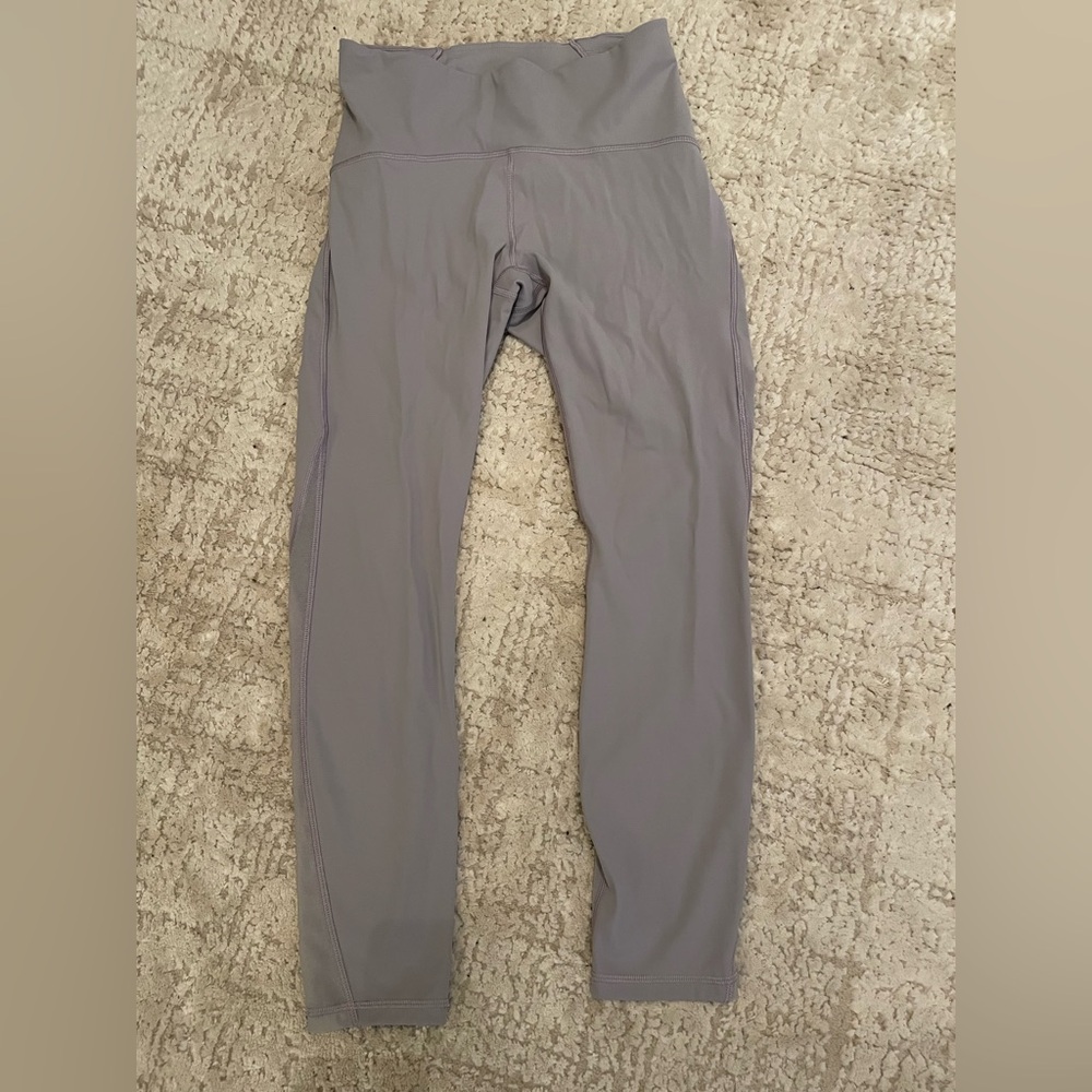 Lululemon Leggings. Gray but also has a hint of purple. Size 8. NWOT